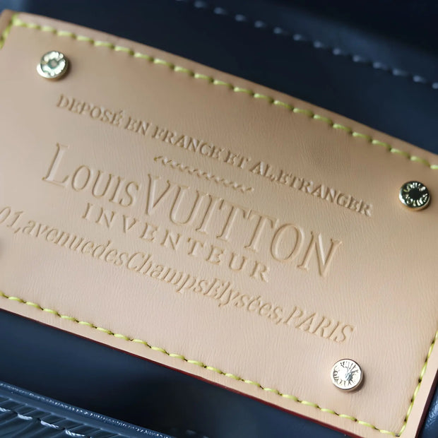 LV Slim Twist Bag